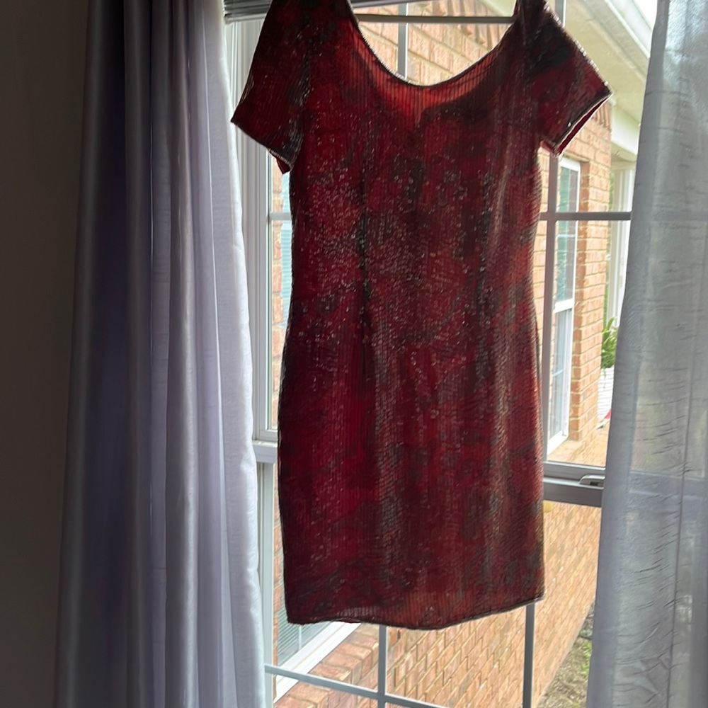 Sequin cocktail dress looks brand new.
